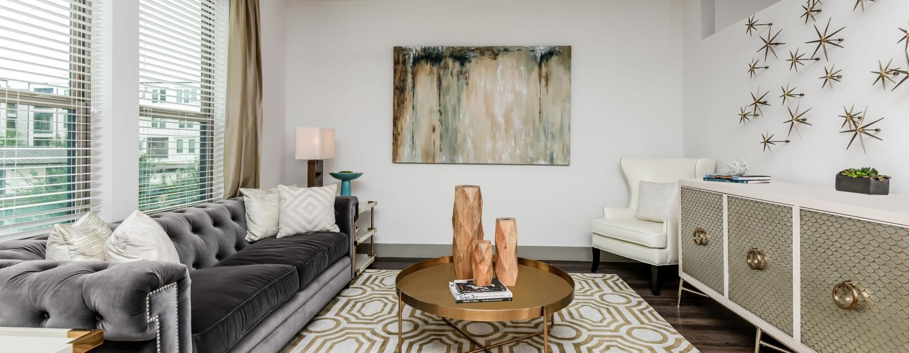 a living room with a couch and a table